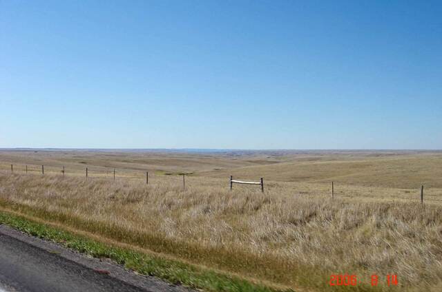 Open grassland along the highway leaving the Badlands