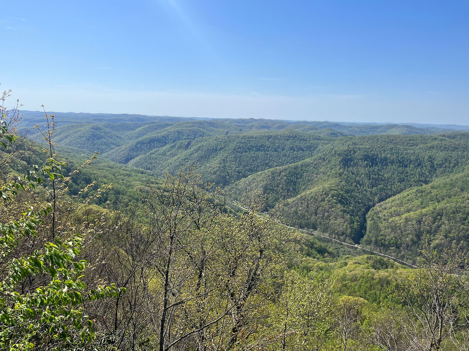 Green mountain ridges and a valley road seen from Kingdom Come State Park